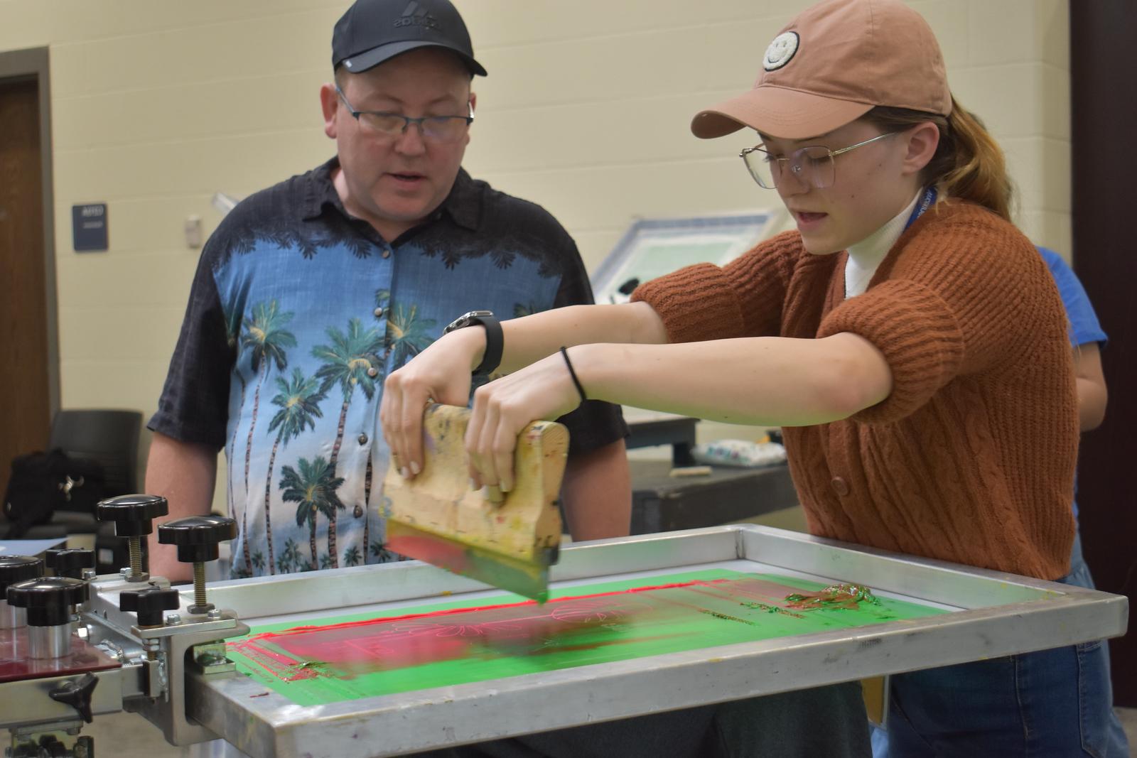 A female student separating paint